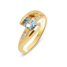  Bague Or Jaune 750 sertie d une aigue marine ovale de7x5mm (0,65 carat) 6 diamants pour un poids total 0,07 carat Largeur...