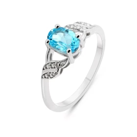 Bague Argent Rhodié Topaze Bleue Ovale 7x5mm Bague sertie d une pierre ovale 7x5mm Corps motifs perlés Pierre sertie à gri...