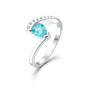 Bague Argent Topaze Bleue traitée Oxyde zirconium Pierre taillée poire mesurant 7x5mm Sertissage Demi Clos Entourage compo...