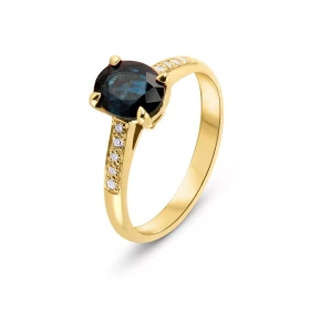  Bague Or Jaune 750 sertie d un Saphir Ovale 8x6mm diamants Poids saphir : 1.3 carat 10 Diamants 1.2mm pour un poids total...