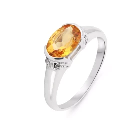 Bague Or Blanc 375 Citrine Diamant Cette jolie monture forme jonc est sertie d une Citrine ovale La pierre mesure 8x6mm El...