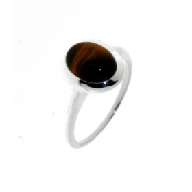 Bague style classique sertie d une pierre ovale La pierre est taillée cabochon , elle mesure 9x7mm Monture solitaire serti...