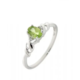 Bague Péridot Diamant Or Blanc 375 Cette bague Or 375 est surmontée d un Péridot serti par 4 griffes Cette pierre est tail...