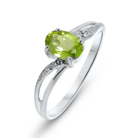 Bague Or blanc 375 Péridot Ovale 7x5mm Diamant Cette bague Or blanc 375 est ornée d un péridot ovale La pierre mesure 7x5m...