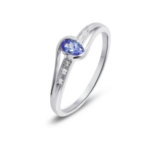 Bague Tanzanite Diamant Or Blanc 375 La pierre centrale est une Tanzanite ovale mesurant 5x3mm Elle est maintenue sur cett...