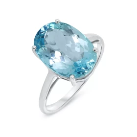  Bague Or blanc 375 Topaze Bleue Ovale 14x10mm Cette bague Or blanc 375 est ornée d une topaze bleue ovale La pierre mesur...