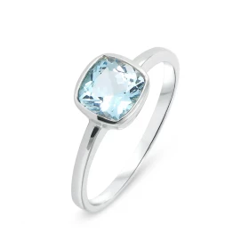  Bague Topaze Bleue Or Blanc 375 La pierre centrale est une Topaze Bleue taille coussin 7x7mm Elle est maintenue sur cette...