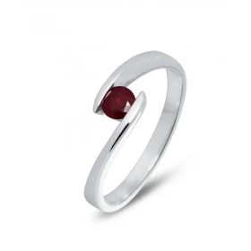  Bague Or blanc 750 sertie d un rubis rond 4mm diamètre (0,25 carat) Serti demi clos Corps croisé Largeur monture (sur doi...