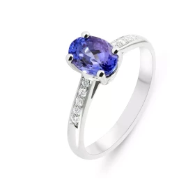  Bague Or Blanc 750 Solitaire Tanzanite Diamant Cette bague est sertie d une Tanzanite Ovale 8x6mm (1.2 carat) 10 diamants...