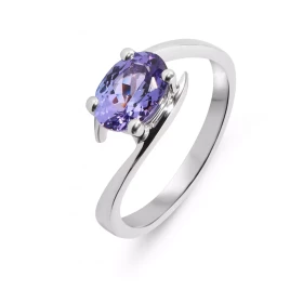  Bague Or Blanc sertie d une Tanzanite ovale 8x6mm (1,1 carat) Largeur monture (vue dessus) : 7,3mm Corps croisé Serti à 4...