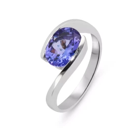  Bague Or Blanc 750 sertie d une Tanzanite AAA Ovale 9x7mm (1.8 carat) La Tanzanite est maintenue par un serti demi clos L...