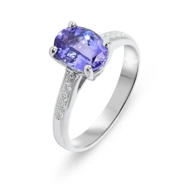  Bague Or Blanc 750 Tanzanite Ovale 8x6mm Diamant Tanzanite ovale 8x6mm (1,2 carat) sertie à griffes Entourage composé 10 ...