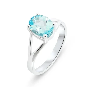 Bague Or Blanc 750 sertie d une Topaze Bleue ovale 9x7mm (2 carats) Serti à griffes
