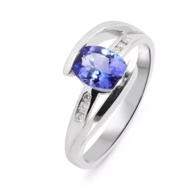  Bague Or Blanc sertie d une Tanzanite ovale 8 x 6 mm (1.2 carat) 6 diamants 1,3mm pour un poids total 0,08 carat Poids Di...