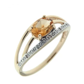 Bague Or jaune 375 sertie d une citrine ovale 7x5mm 5 diamants Largeur bague (sur doigt, vue dessus) : 7,1mm Poids Diamant...