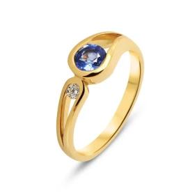  Bague Or Jaune 750 sertie d un Saphir Ceylan Rond 5mm d un diamant rond 2,2mm Serti demi clos Poids Diamant : 0,045 carat...