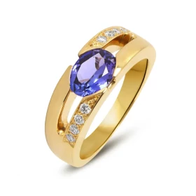  Bague Or Jaune sertie d une Tanzanite ovale 8 x 6 mm (1,20 carat) 8 diamants 1,4mm diamètre pour un poids total 0,10 cara...