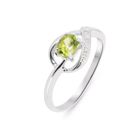 Bague Péridot Diamant Or Blanc 375 Cette bague Or 375 est surmontée d un Péridot serti par 4 griffes Cette pierre est tail...