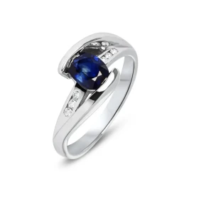  Bague Or Blanc sertie d un Saphir ovale 7x5mm (1 carat) 6 diamants pour un poids total 0,08 carat Qualité Diamant : G Si ...