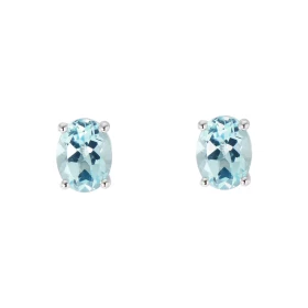 Boucles d oreilles Or Blanc 750 Topaze bleue traitée Ovale 8x6mm Boucles d oreilles type puces Or Blanc 750 Pierres ovales...