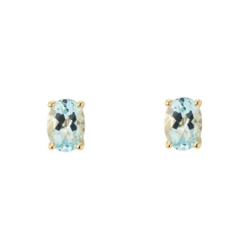 Boucles d oreilles Or Jaune 750 Topaze bleue traitée Ovale 7x5mm Boucles d oreilles type puces Or Jaune 750 Pierres ovales...