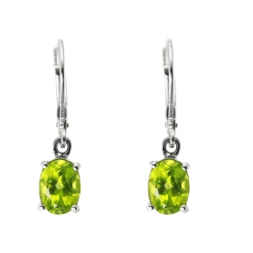 Boucles d oreilles Pendantes Argent Rhodié Péridot ovale 8x6mm Longueur d une boucle : 26mm Pierres ovales 8x6mm serties à...