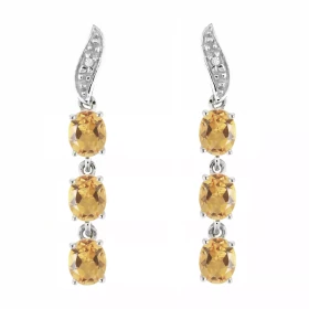 Boucles d oreilles Or blanc 375 serties 6 citrines ovales 4x3mm 2 diamants Longueur : 25mm Poids Diamant : 0,01 carats Qua...