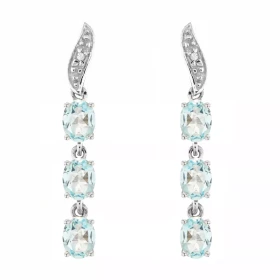 Boucles d oreilles Or blanc 375 serties 6 topazes bleues traitées ovales 4x3mm 2 diamants Longueur : 25mm Poids Diamant : ...