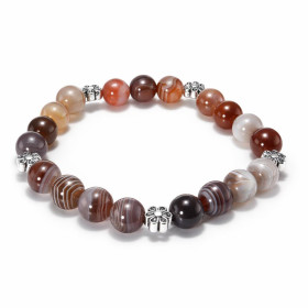 Bracelet Agate Botswana 8mm fleur métal Ce Bracelet est composé perles 8mm Agate Botswana 5 intercalaires métal représenta...