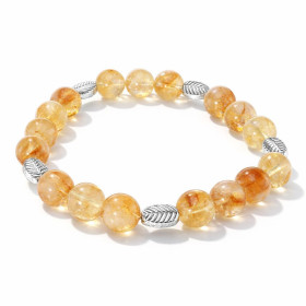 Bracelet Citrine 8mm Feuille métal Ce Bracelet est composé perles 8mm Citrine 5 intercalaires métal représentant une feuil...