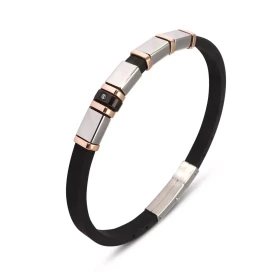 Bracelet contemporain mêlant caoutchouc noir éléments acier inoxydable Un oxyde zirconium est serti sur l élement noir Lon...