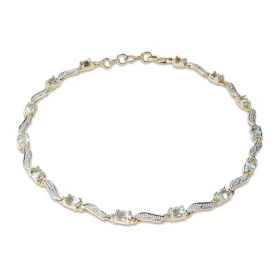 Bracelet Or Jaune 375 2 tons Aigues Marines Ce bracelet est serti 14 aigues marines ovales 4x3mm espacées par des motifs o...