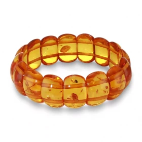 Bracelet Plaquettes Ambre 19.5mm x 18cm Ambre couleur cognac Enfilage sur élastique double Largeur : 19.5mm Longueur : 18c...