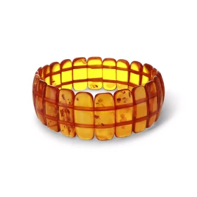 Bracelet Plaquettes Ambre couleur cognac 22mm x 18.8cm Ambre couleur cognac Enfilage sur élastique double Largeur : 22mm L...