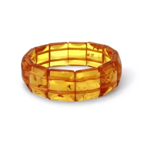 Bracelet Plaquettes Ambre couleur miel 19.4mm x 17.2cm Ambre couleur miel Enfilage sur élastique double Largeur : 19.4mm L...