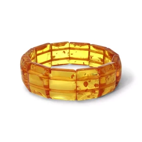 Bracelet Plaquettes Ambre couleur miel 19.9mm x 17.2cm Ambre couleur miel Enfilage sur élastique double Largeur : 19.9mm L...