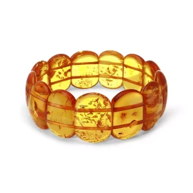 Bracelet Plaquettes Ambre couleur miel 23mm x 18.2cm Ambre couleur miel Enfilage sur élastique double Largeur : 23mm Longu...