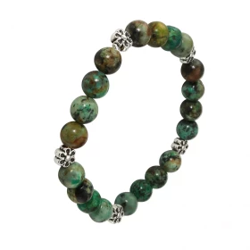 Bracelet Turquoise 8mm Motif Fleur Ce Bracelet est composé 20 perles 8mm Turquoise Africaine 5 intercalaires métal représe...