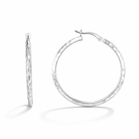 Créoles argent 925 rhodié composées d un anneau martelé section triangulaire 2,4mm large Système d attache : tige sur une ...