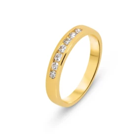  Bague Or Jaune sertie 7 diamants pour un poids total 0,24 carat Largeur monture (vue dessus) : 3,8mm Qualité Diamant : G ...
