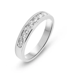  Demi alliance or blanc 750 sertie 7 diamants 2,5 mm diamètre Largeur monture : 3,8mm Serti rail Poids total diamant : 0,4...