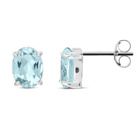  Puces d oreilles Or blanc 375 Topaze Bleue traitée Ovale 8x6mm Puces d oreilles Or blanc 375 (9 carats) Topazes Bleues tr...