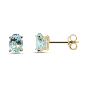 Puces d oreilles Or jaune 375 Topaze bleue Ovale 7x5mm Puces d oreilles Or jaune 375 (9 carats) Pierres ovales 7x5mm (0,65...