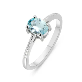 Solitaire Argent Rhodié Topaze Bleue Ovale 7x5mm Bague sertie d une pierre ovale 7x5mm Monture solitaire motifs perlés sur...
