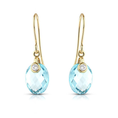 B.O Topaze bleue traitée Dome 9x7mm et Diamant Or Jaune 750