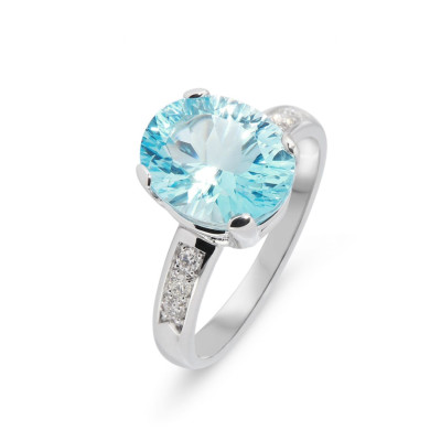 Bague Or Blanc 750 Topaze Bleue traitée Ovale 11x9mm et diamants
