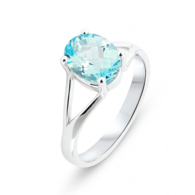 Bague Or Blanc 750 Topaze Bleue traitée Ovale 9x7mm
