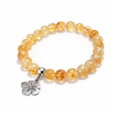 Bracelet Citrine 8mm et Breloque Hibiscus en Acier