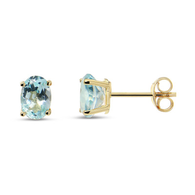 Puces d'oreilles Or jaune 375 Topaze bleue traitée Ovale 7x5mm