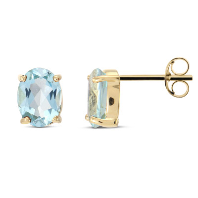 Puces d'oreilles Or jaune 375 Topaze Bleue traitée Ovale 8x6mm